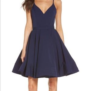 Fit and flare cocktail dress with pockets.